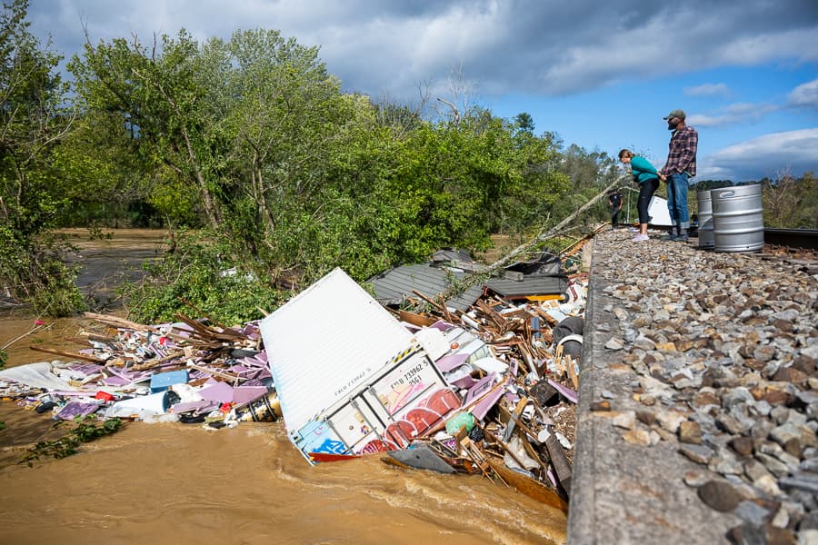 People looking down on disaster after Hurricane Helene.