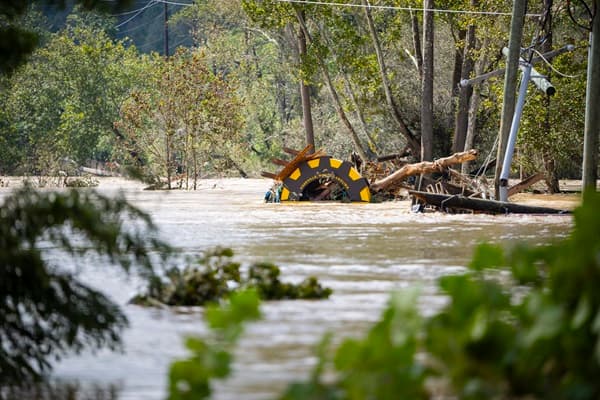 Tractor tire in flood waters.