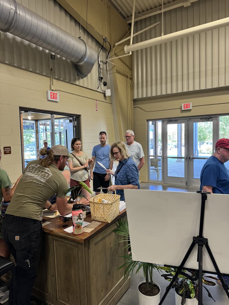 People checking into an event.