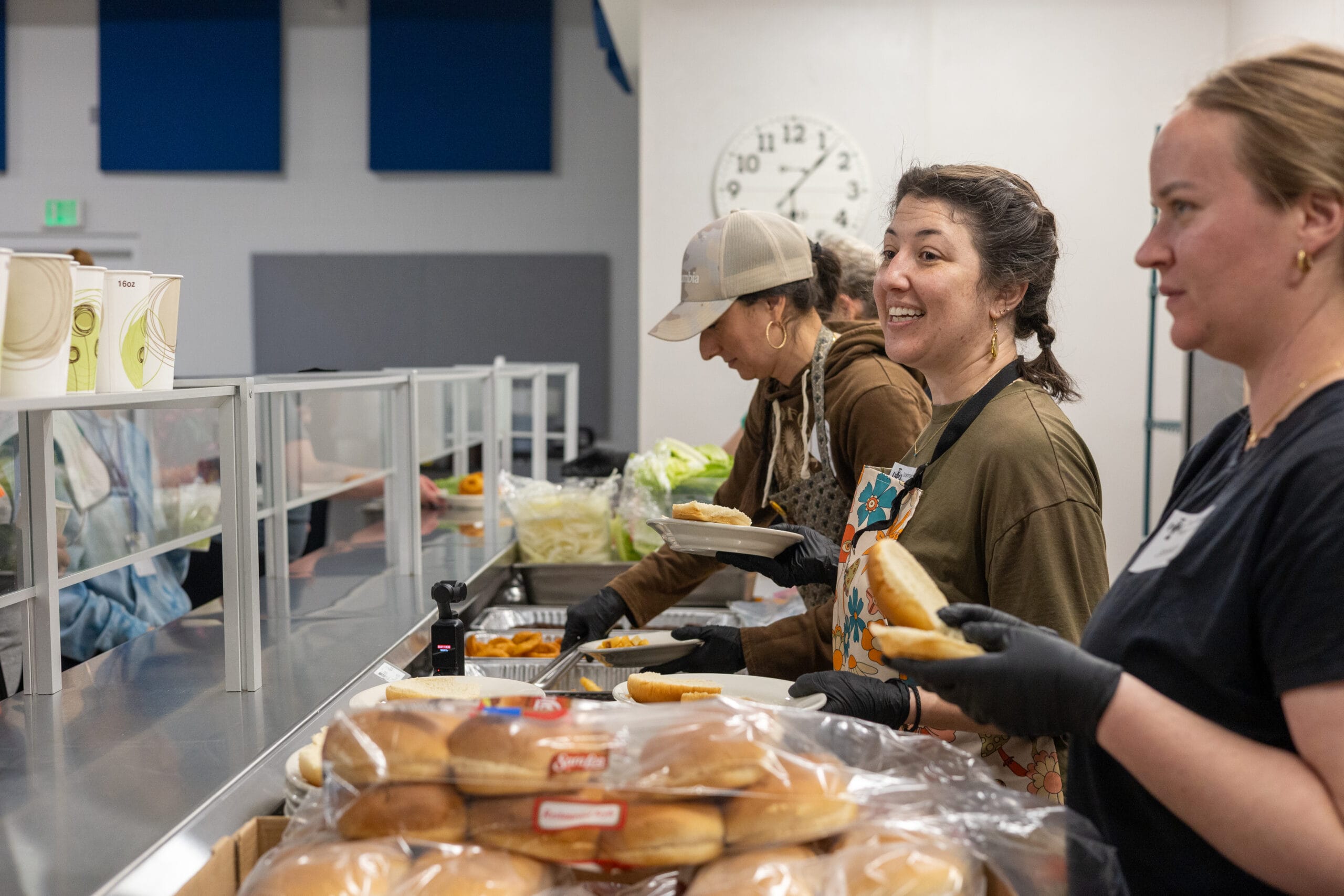 PWB serving dinner at Transformation Village